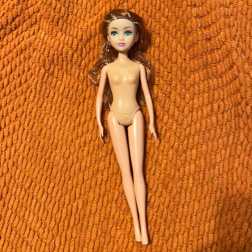 One Barbie. (No clothes). Chelsea carnival game.